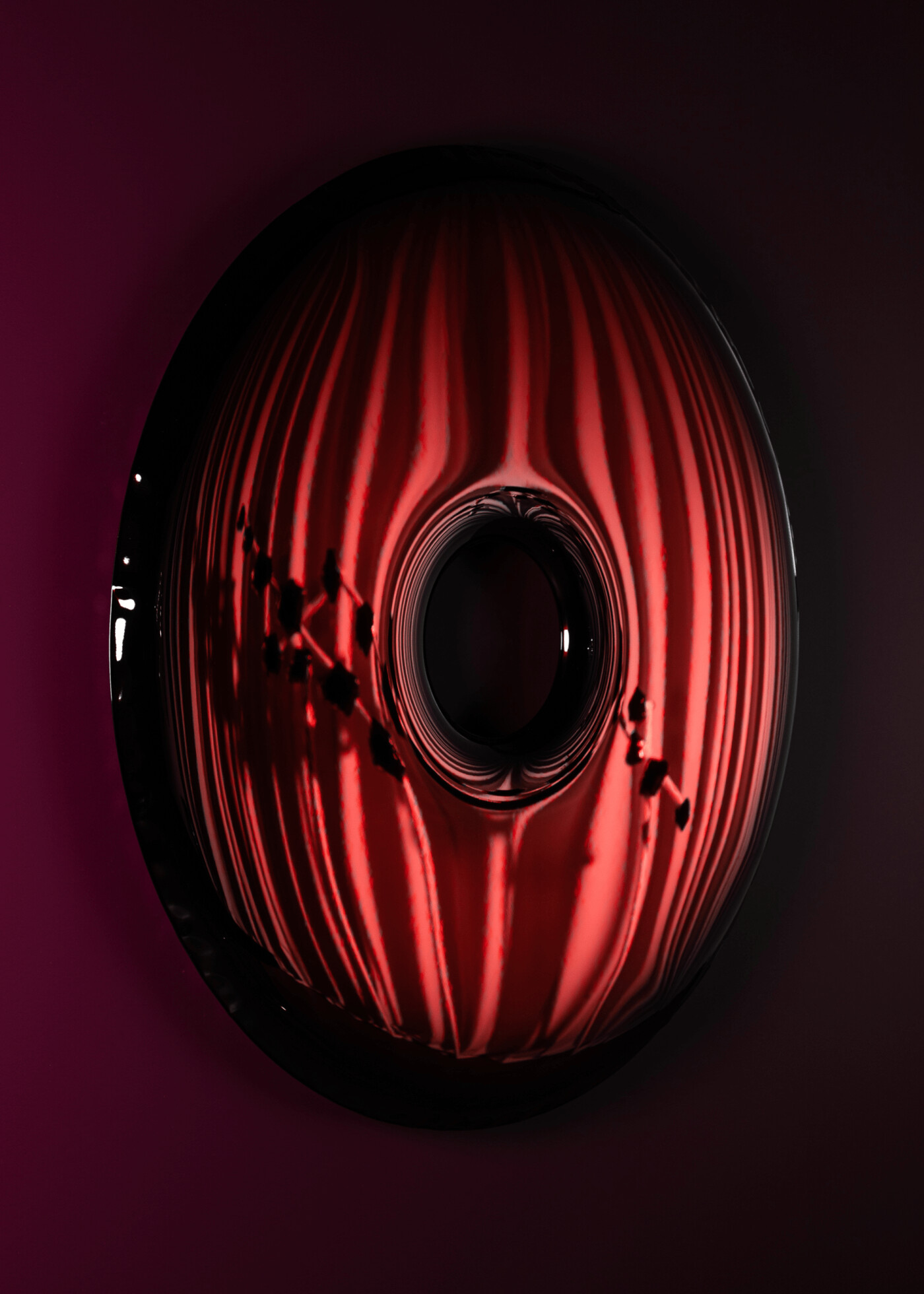 rondo mirror donut shaped red rubin finish 