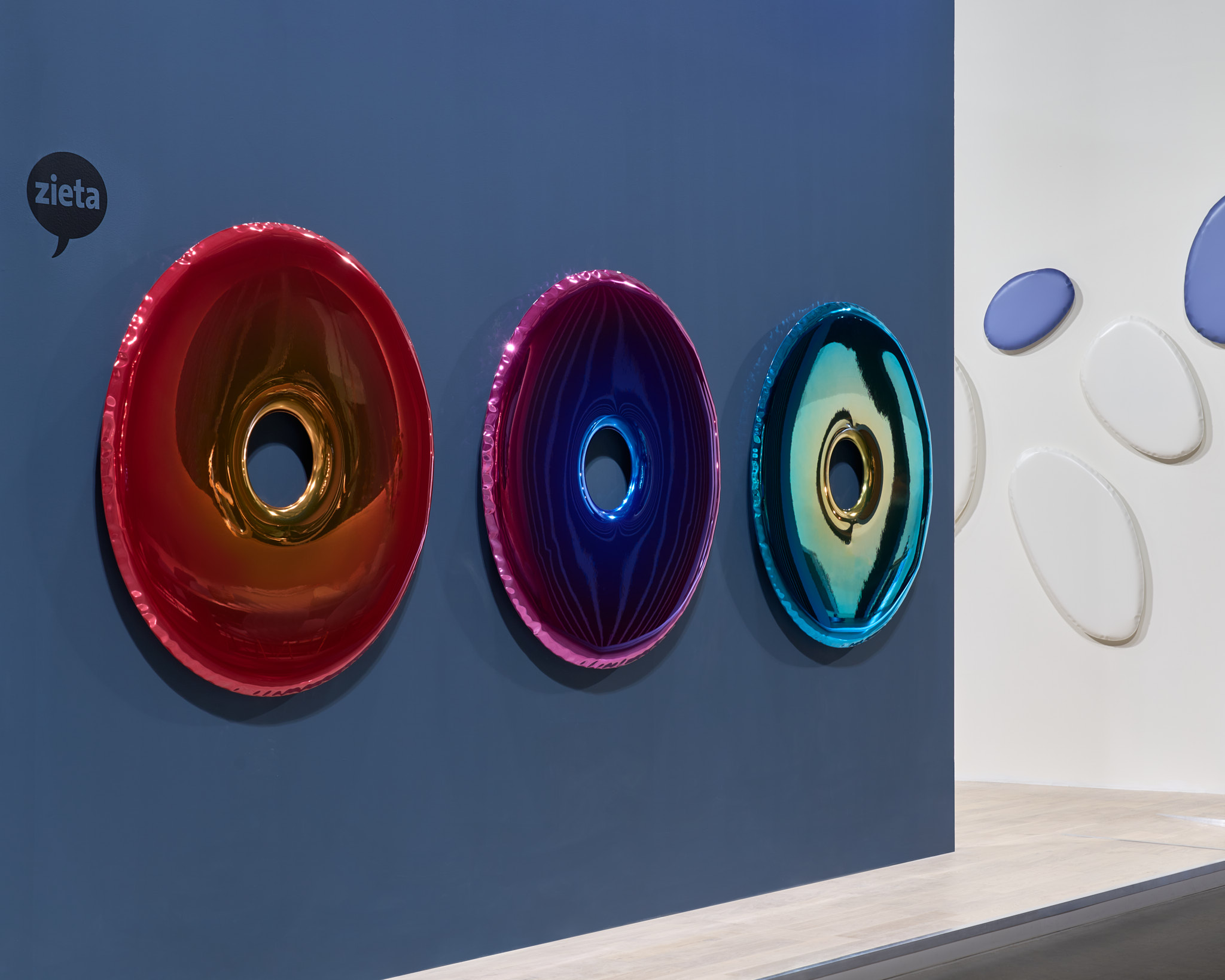 Zieta Studio stand at Salone del Mobile.Milano helix nebula mirror