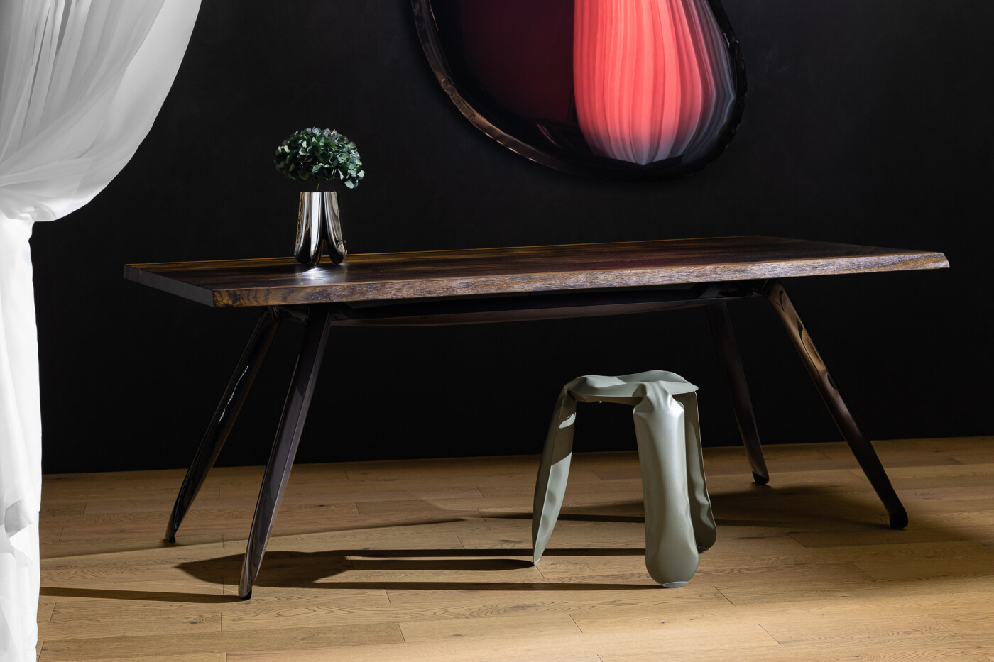 Zieta_NOGI_Table_Construction_black_glossy_ROTATION_VASE_inox_polished_PLOPP_Stool_Standard_moss_grey_Zieta_Collection_TAFLA_O_red_rubin_Transitions_Collection_WH_2022_photo_by_Weronika_Trojanowska