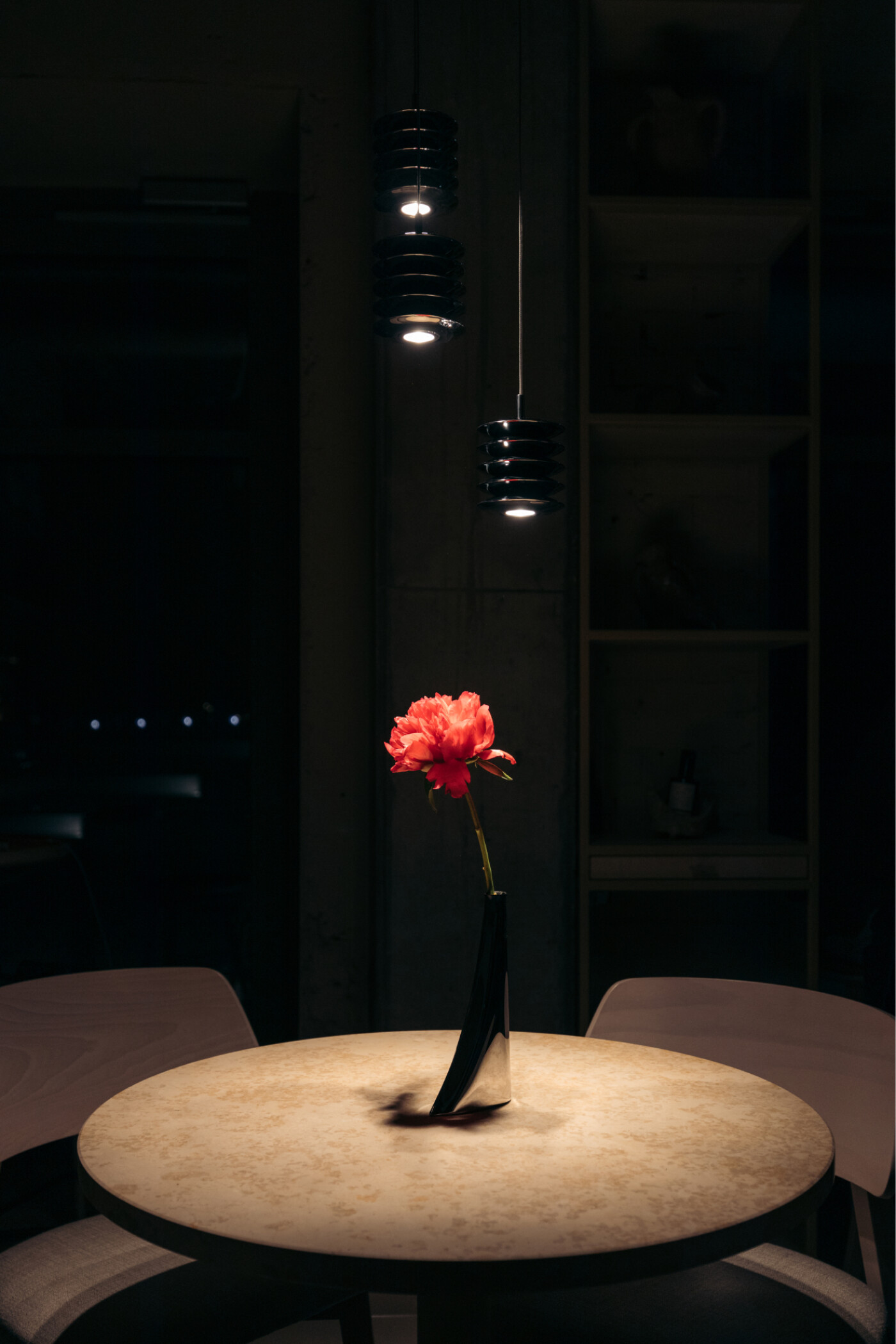 Zieta Studio Harmonica lamp and Leyki vase in polished Inox finish. Stainless steel lighting and sculptural vessel, precision-formed with FiDU technology. Ideal for contemporary, industrial, and minimalist interiors.