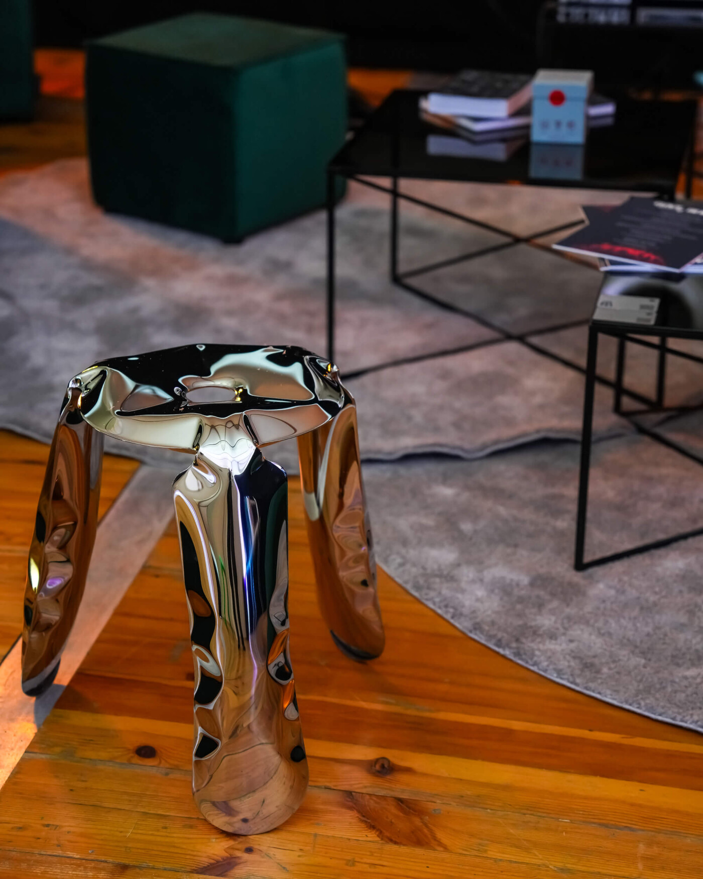 Plopp stool by Zieta Studio made of polished inflated stainless steel in a modern interior