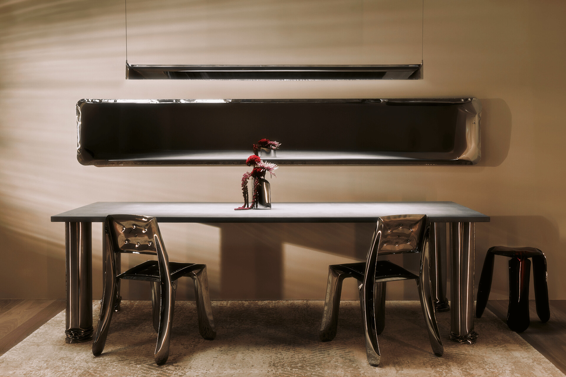 zieta crash table with chippensteel chairs in interior
