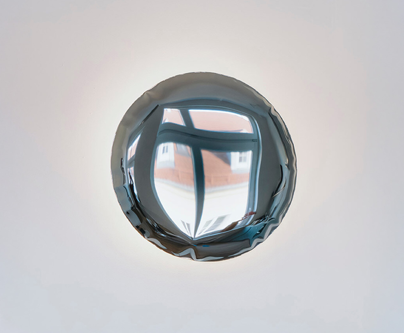 zieta kin wall lamp on a white wall