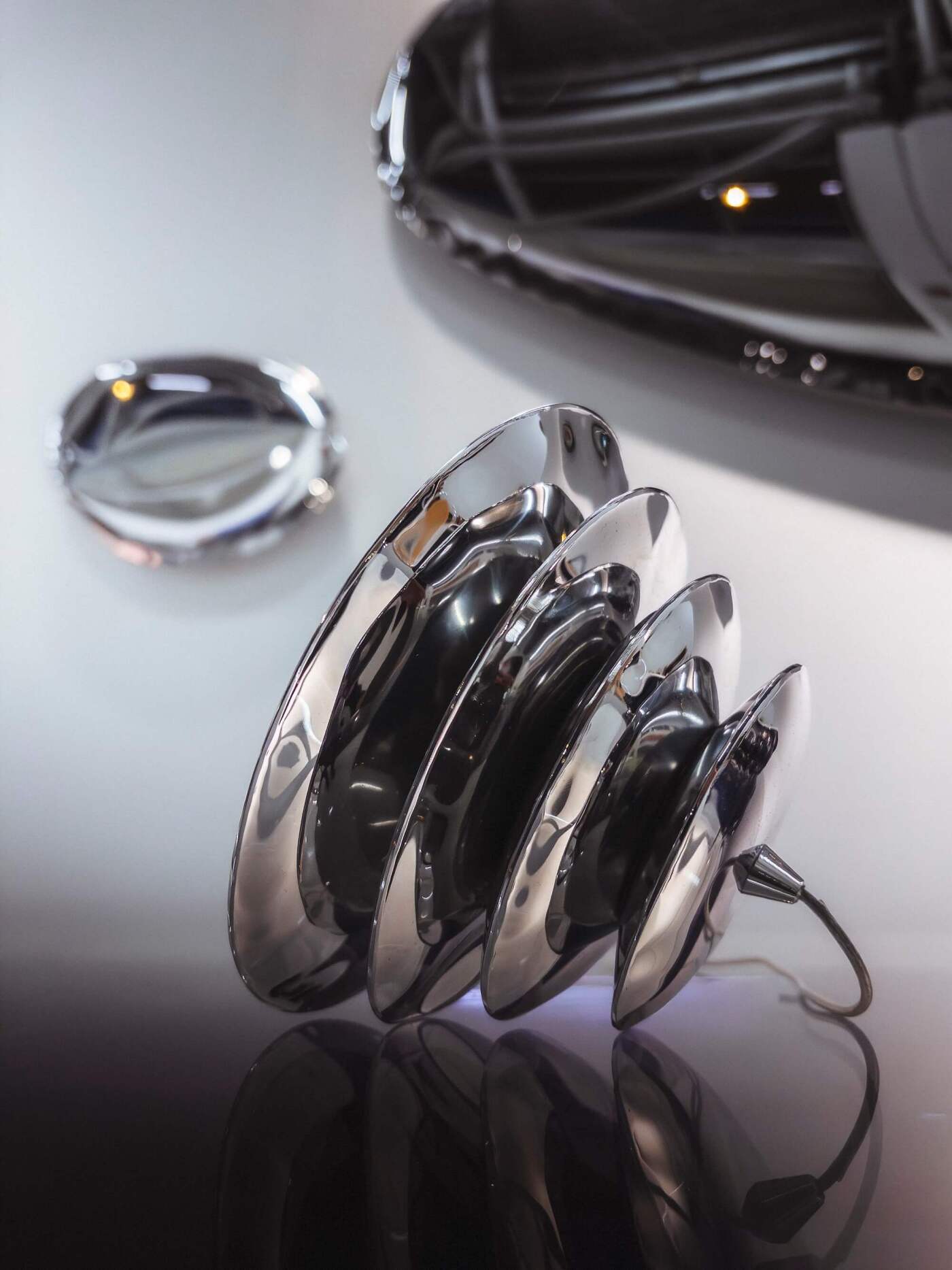 zieta harmonica cone with tafla o mirrors in the background