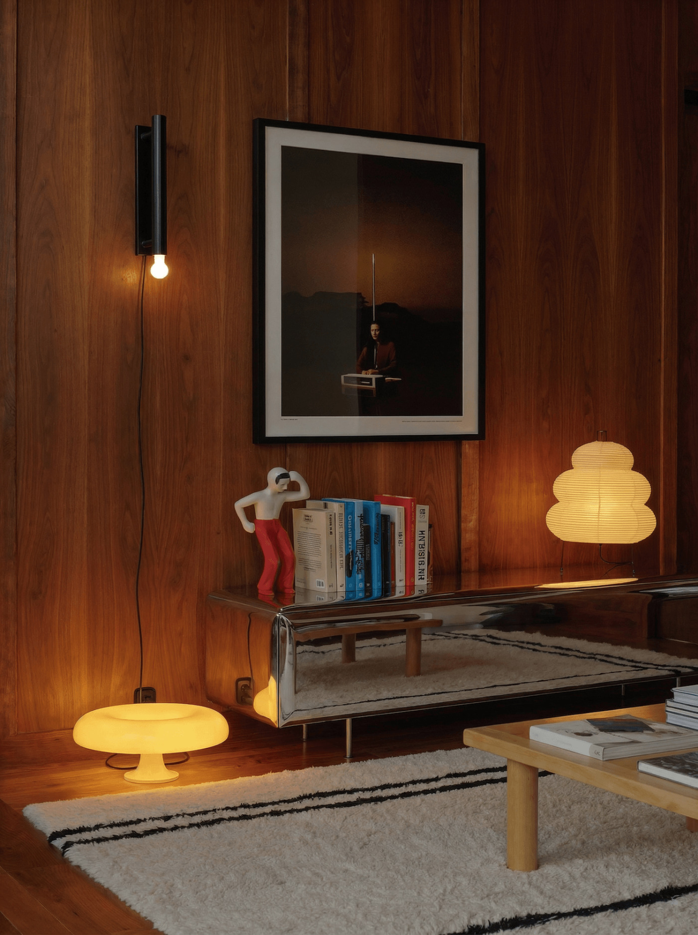 Zieta studio sejv arranged in a room with a wooden wall