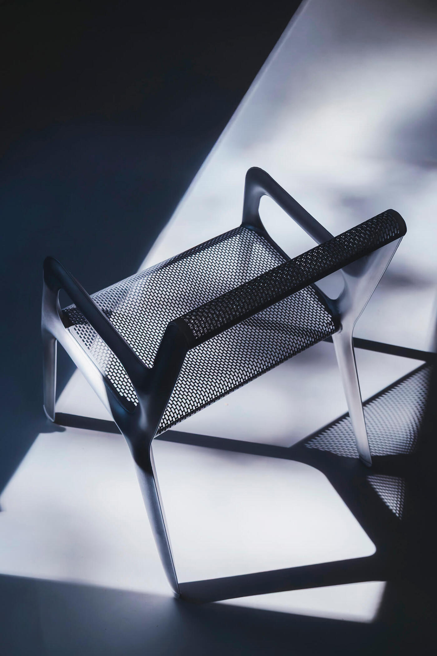 Ultraleggera Arm Chair in a contrast lighting