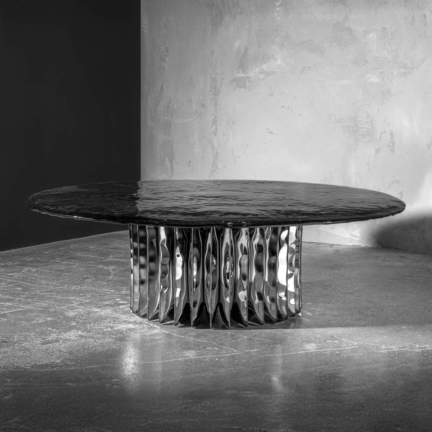 zieta echo table inox in a black and white scenery