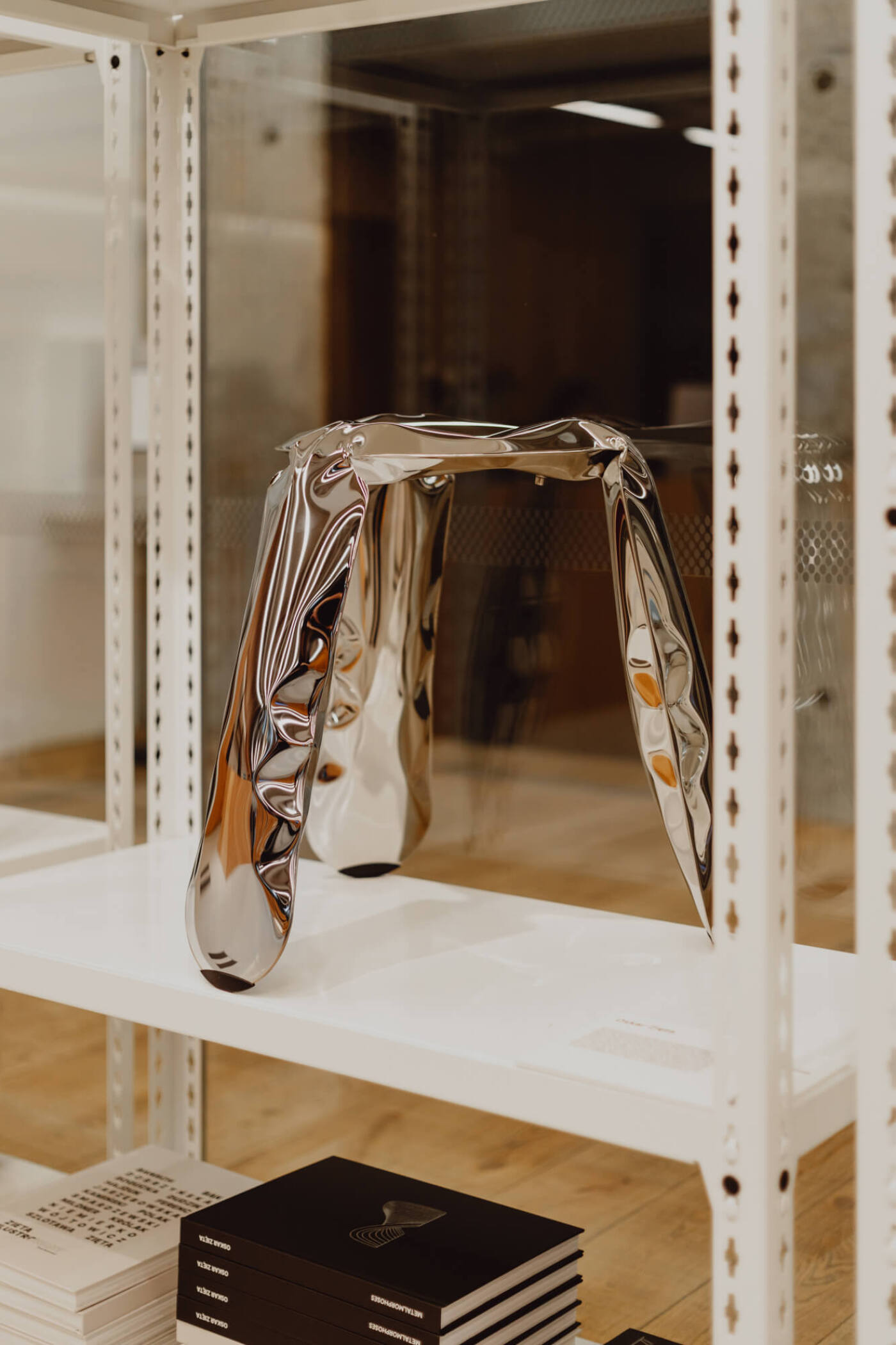 zieta plopp stool inox on a shelf