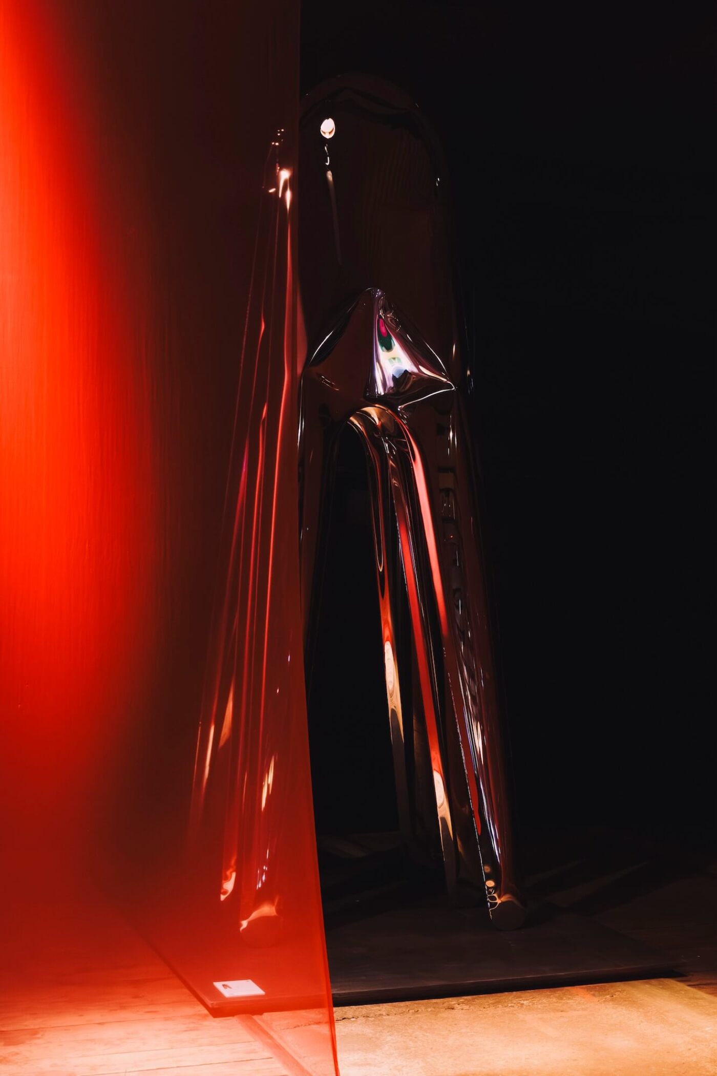 zieta cyclops sculpture in a dark room illuminated by soft ligh