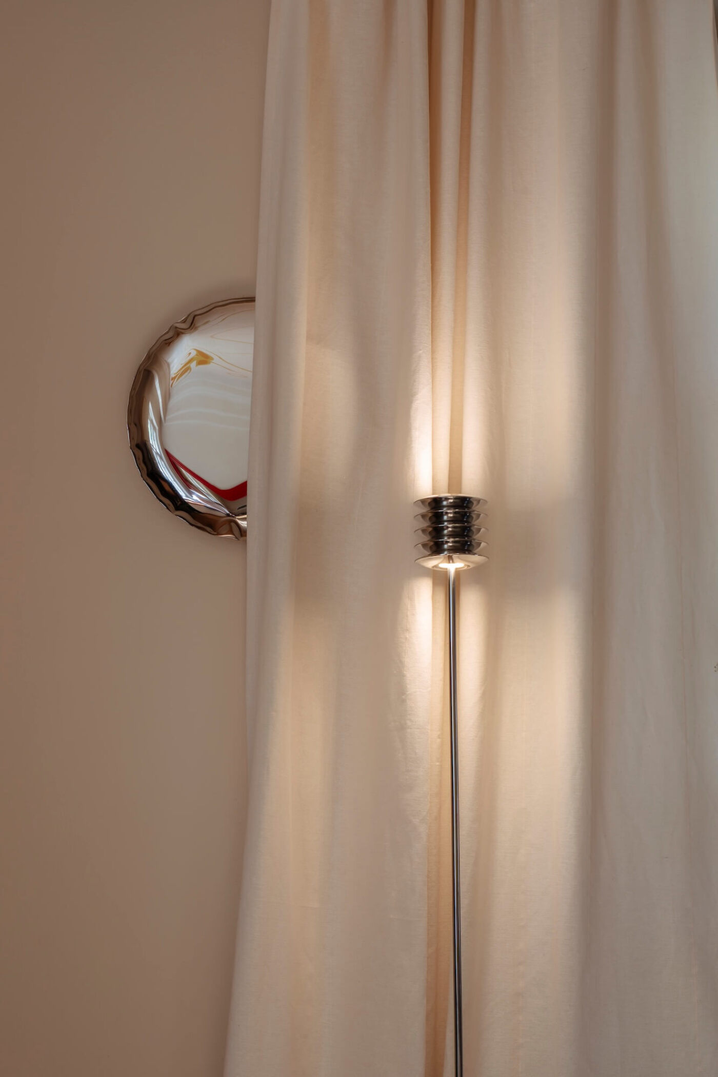 zieta harmonica floor in front of a white curtain