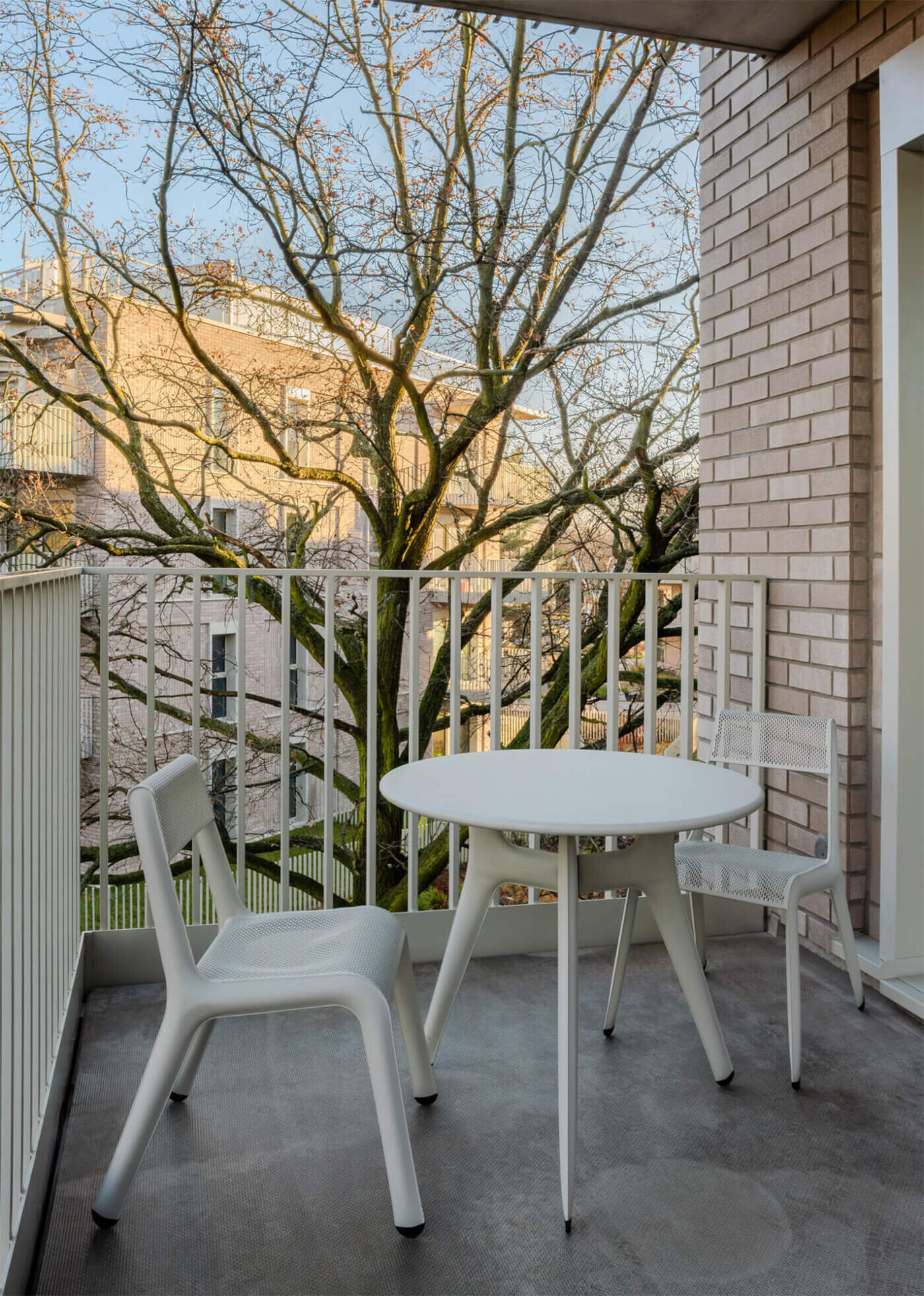 zieta white ultraleggera chair and coffee table on a balcony