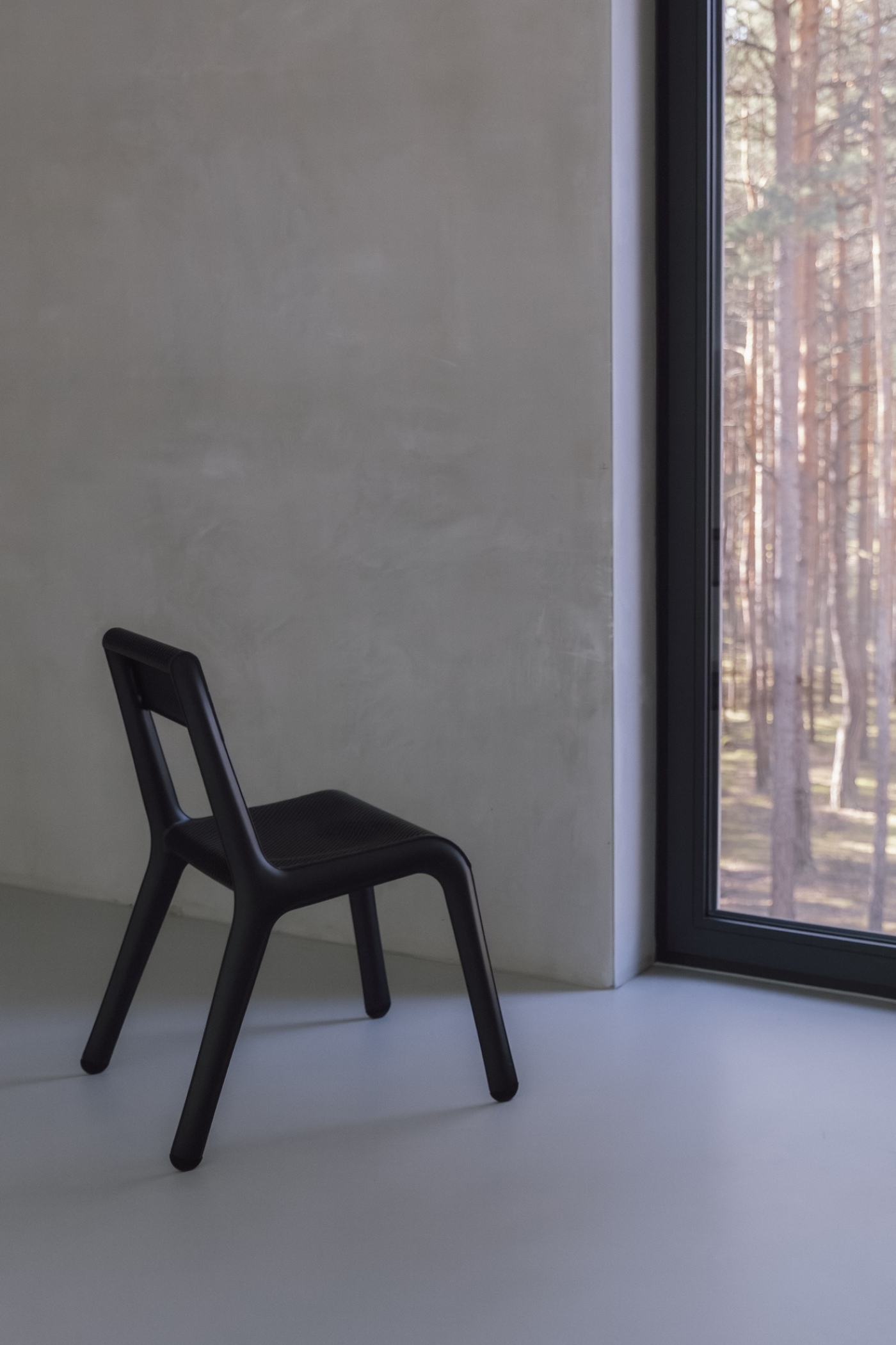 zieta black ultraleggera in a minimalist, empty room