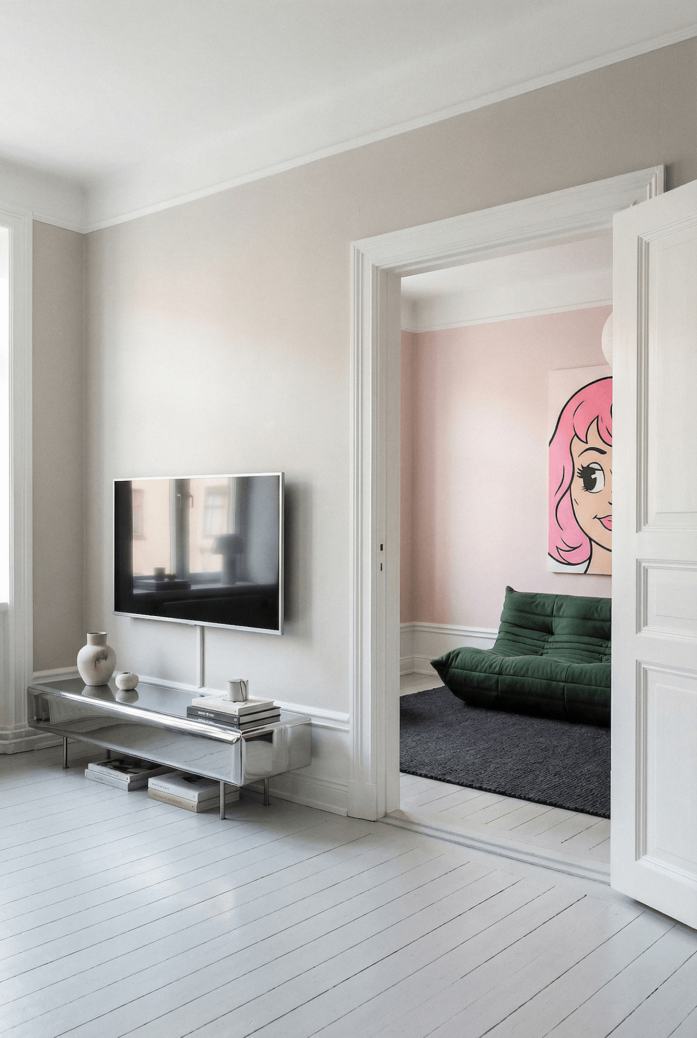 zieta sejv inox as a tv cabinet in a colorful aparment