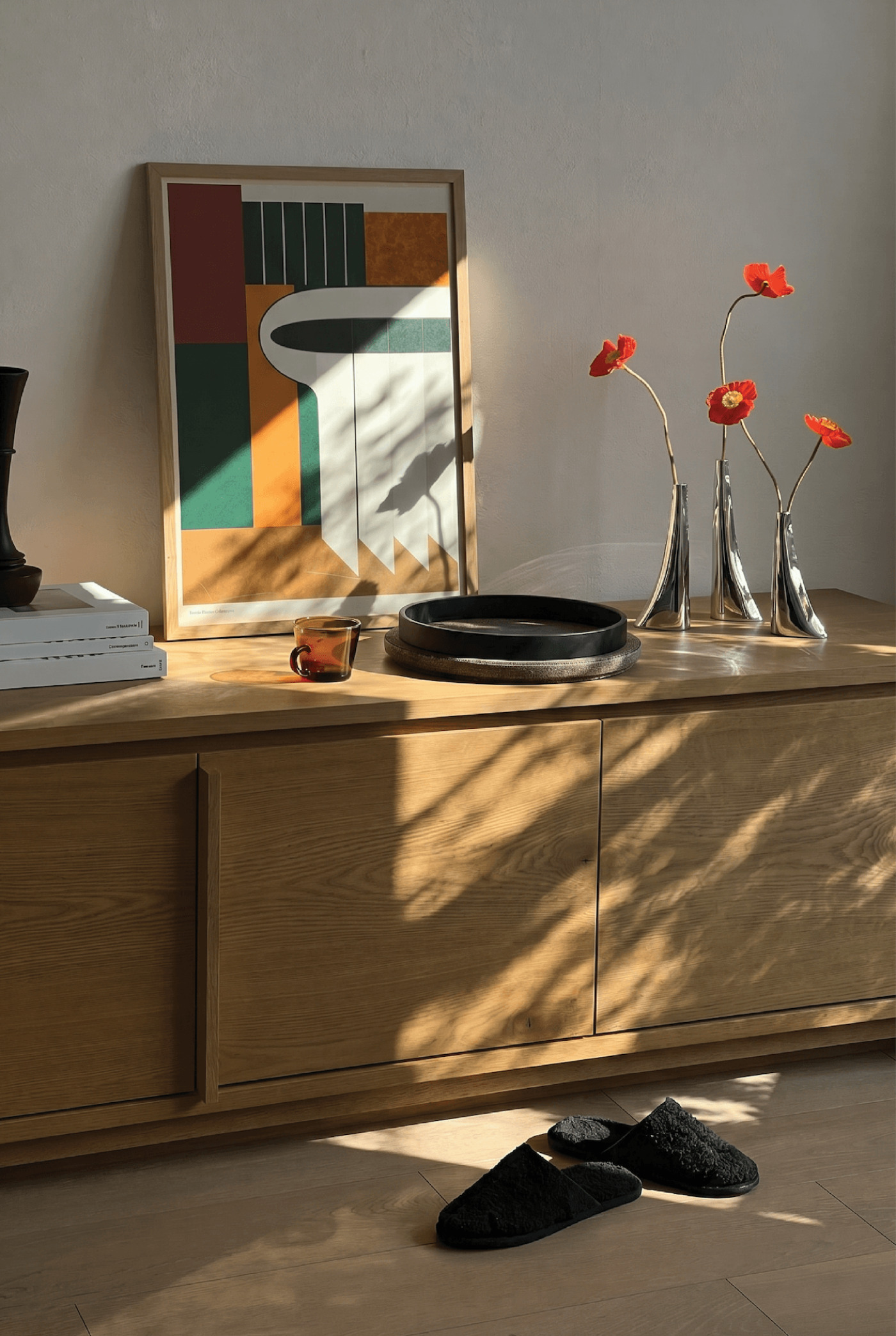 zieta leyki vase set on top of light wood dresser