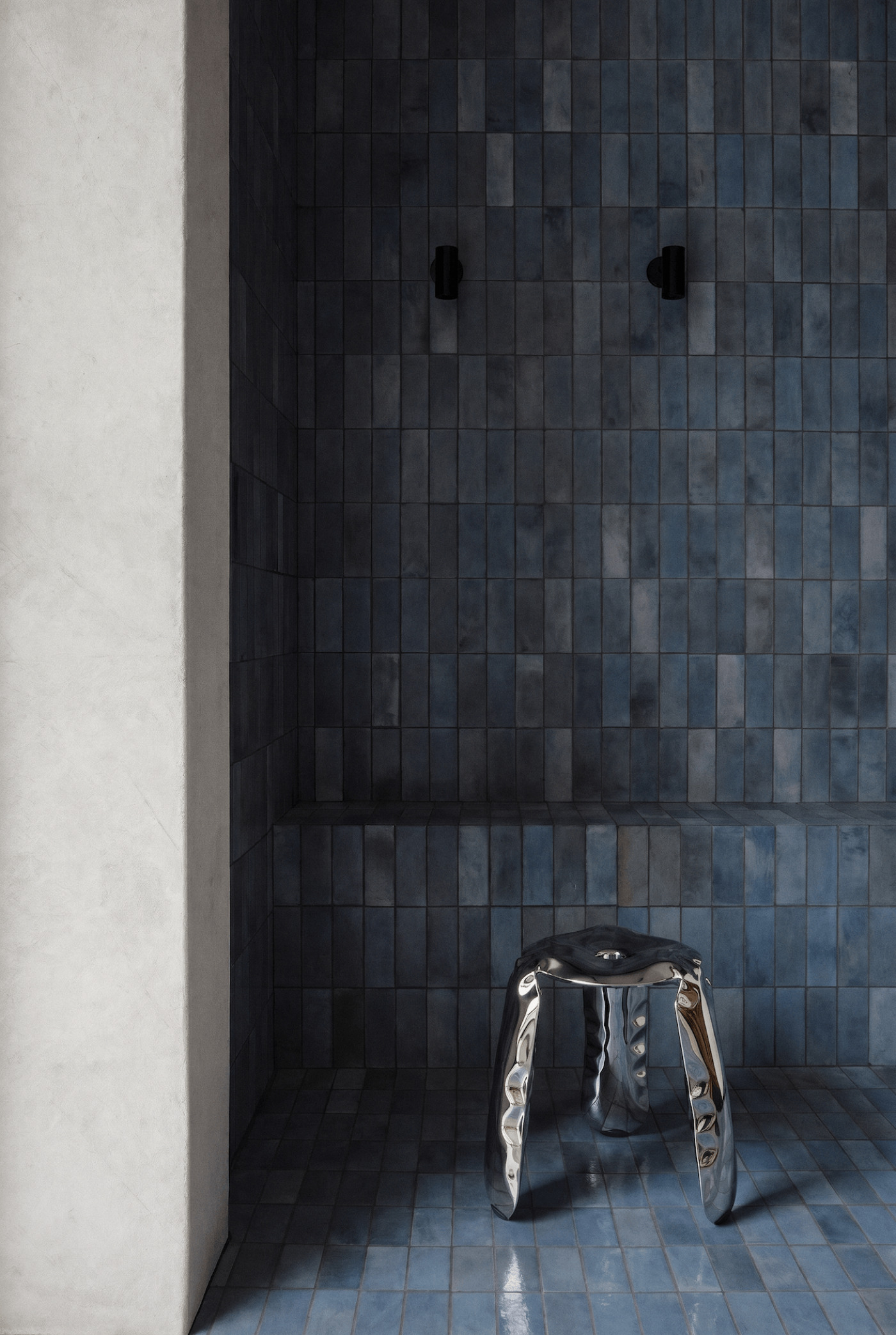 plopp standard inox with blue tiles in the backgorund