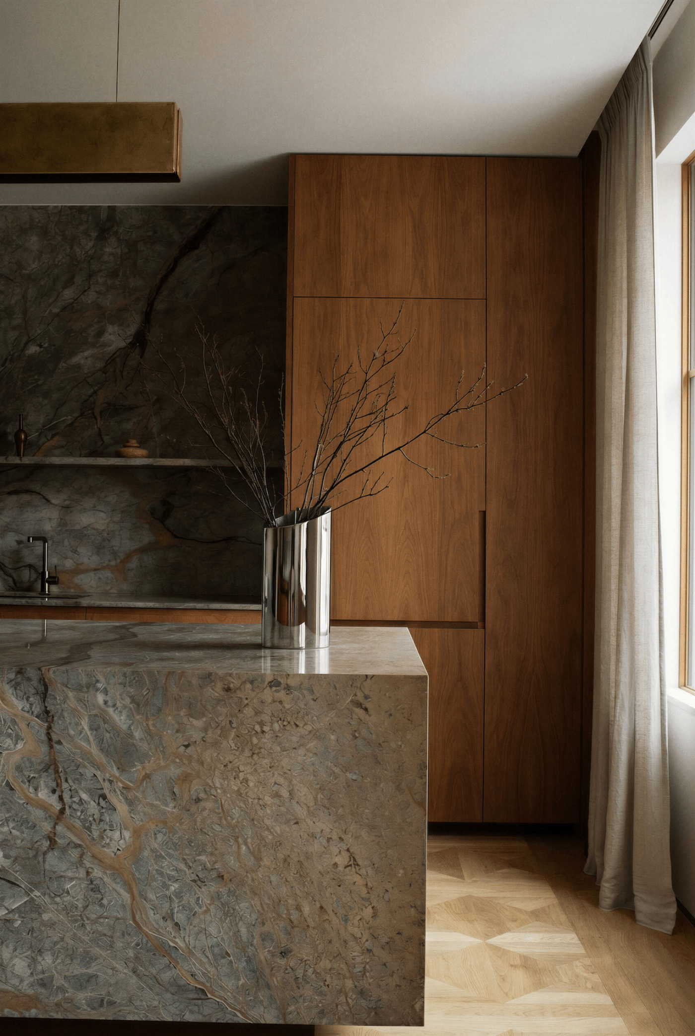 zieta parova inox vase on a natural stone counter