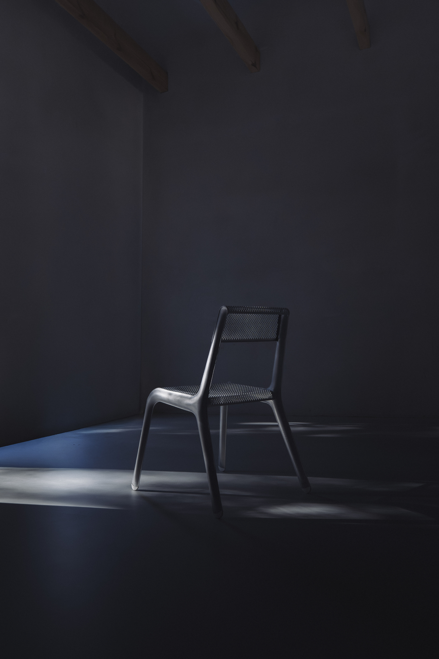 zieta ultraleggera chair in a contrast lighting