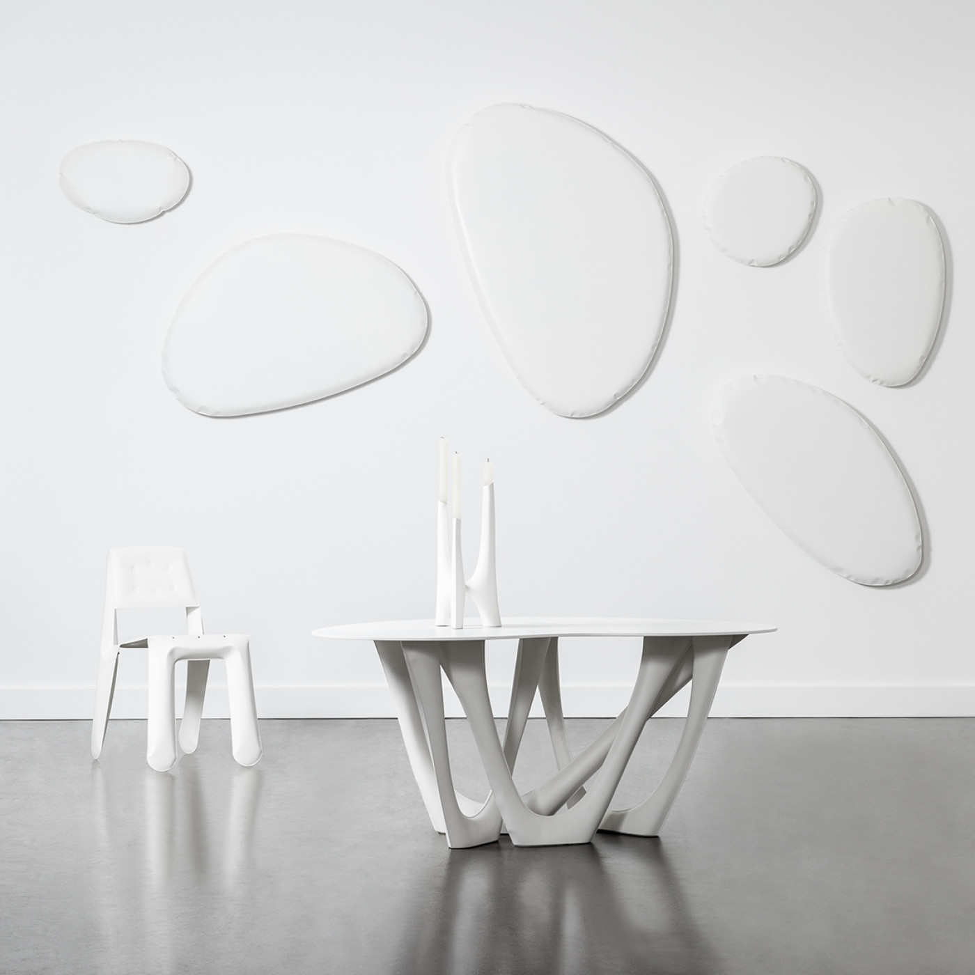 chippensteel chair and g table in interior setting 