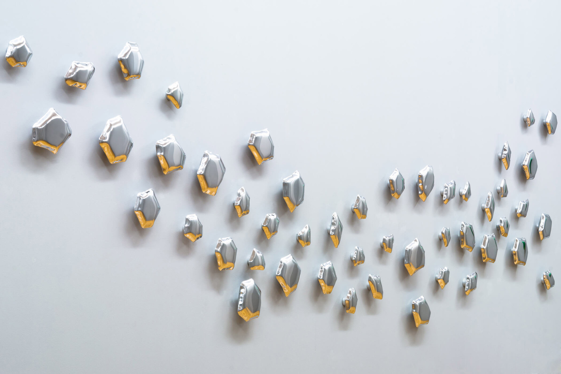 decorative hangers on the wall by zieta studio 